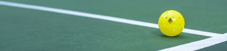 Banner image showing a JOOLA Primo Pickleball on a pickleball court.