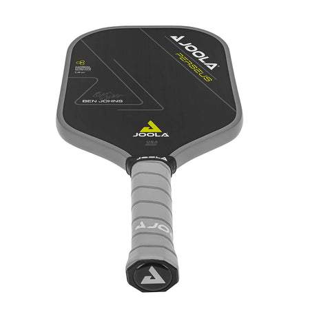 White Background Image: JOOLA Ben Johns Perseus CFS 14 with black paddle face, lemon accent font and JOOLA Trinity logo, gray edge guard, gray Feel-Tec Pure Grip