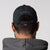 A view of the back of a JOOLA Essential Cap, black. The JOOLA logo and trinity logo appear on the back.