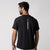 Image showing a JOOLA logo and white stripe down the back of a JOOLA Men's Court Short Sleeve Shirt, black.