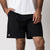 Close up image of the JOOLA Men's Woven Shorts with a seven inch inseam, black.