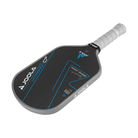 White Background Image: Simone Jardim Hyperion C2 Pickleball paddle. Black surface with blue lines and Simone Jardim's signature. Grey handle and grey edge guard with white JOOLA logo.