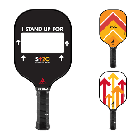 White Background Image: (Left) Front of the JOOLA Stand Up To Cancer Pickleball Paddle. Black paddle surface with the words, 