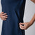 Close up image of the side panel detail with invisible zip pockets on the JOOLA Women's Club Polo Dress, Navy.