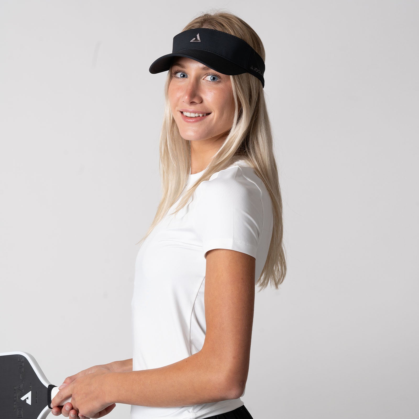 Female model wearing a Women's Club Short Sleeve Shirt, White.