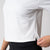 Close up image showing the hem vent on the side of a JOOLA Women's Court Crop Tee, White.