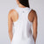 Image showing the back of a female model who is wearing a JOOLA Women's Court Tank, White.