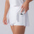 Image showing the hidden under shorty pocket on the JOOLA Women's Pickleball Skort, White.